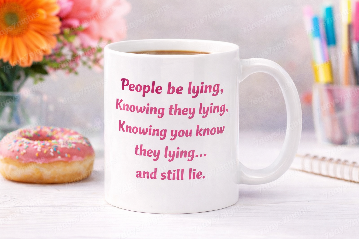 Side view of ceramic coffee mug with bold quote design.