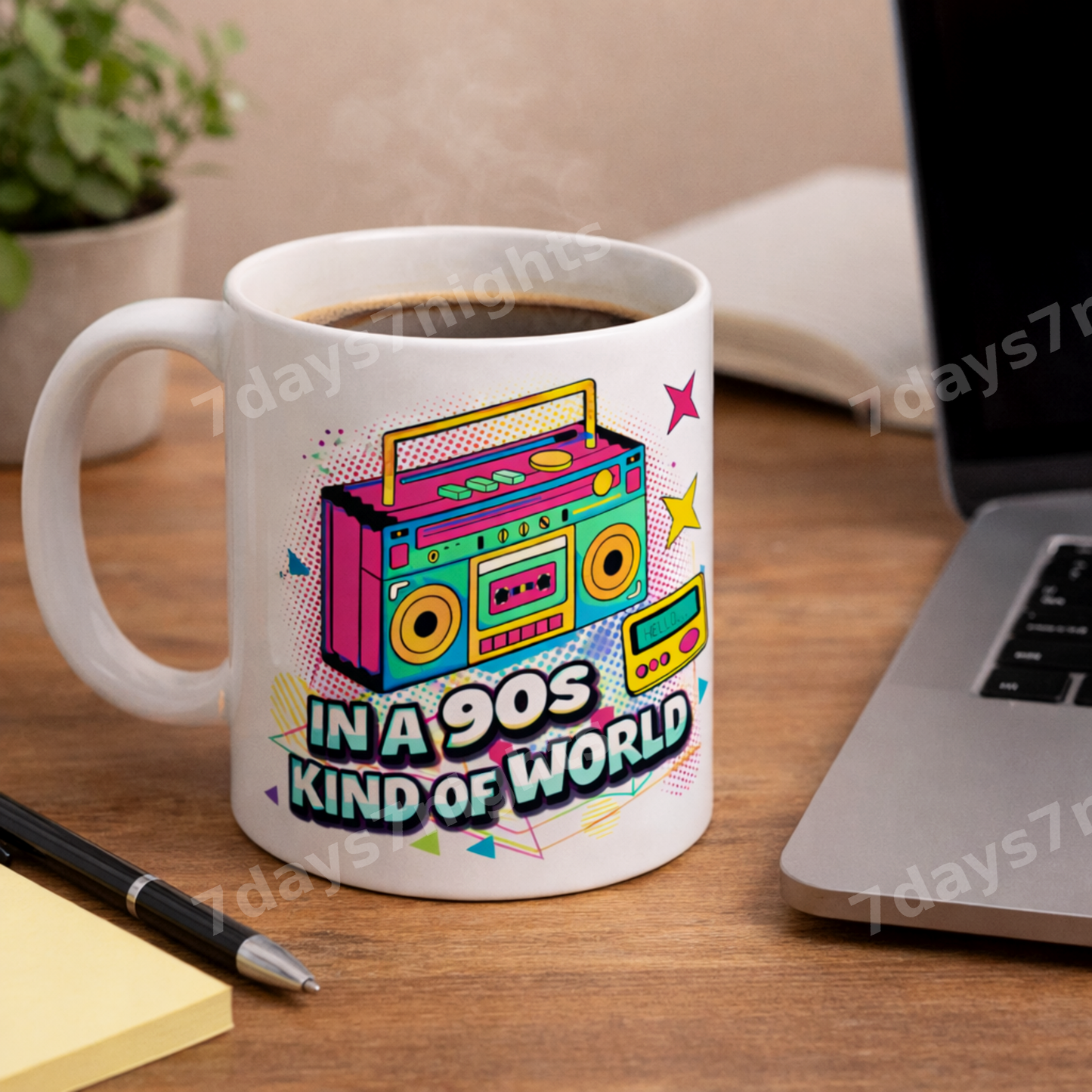 90s coffee mug on desk with laptop and notebook