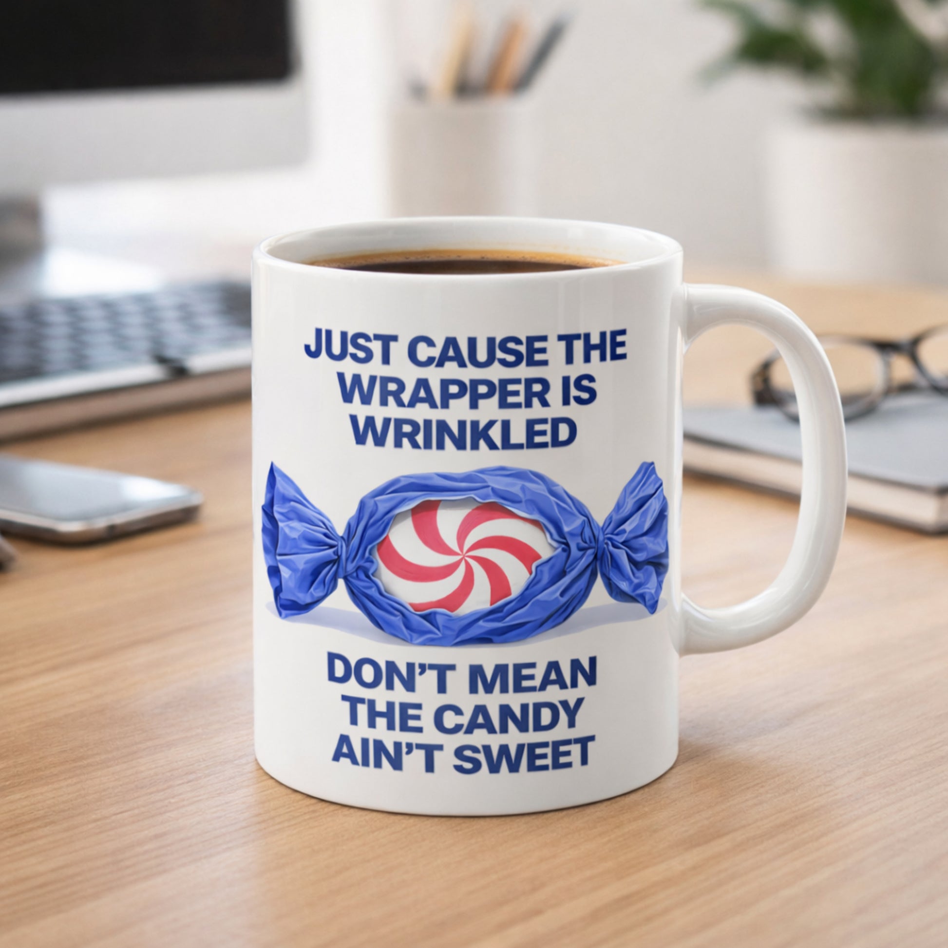 Ceramic quote mug on desk with coffee in modern workspace