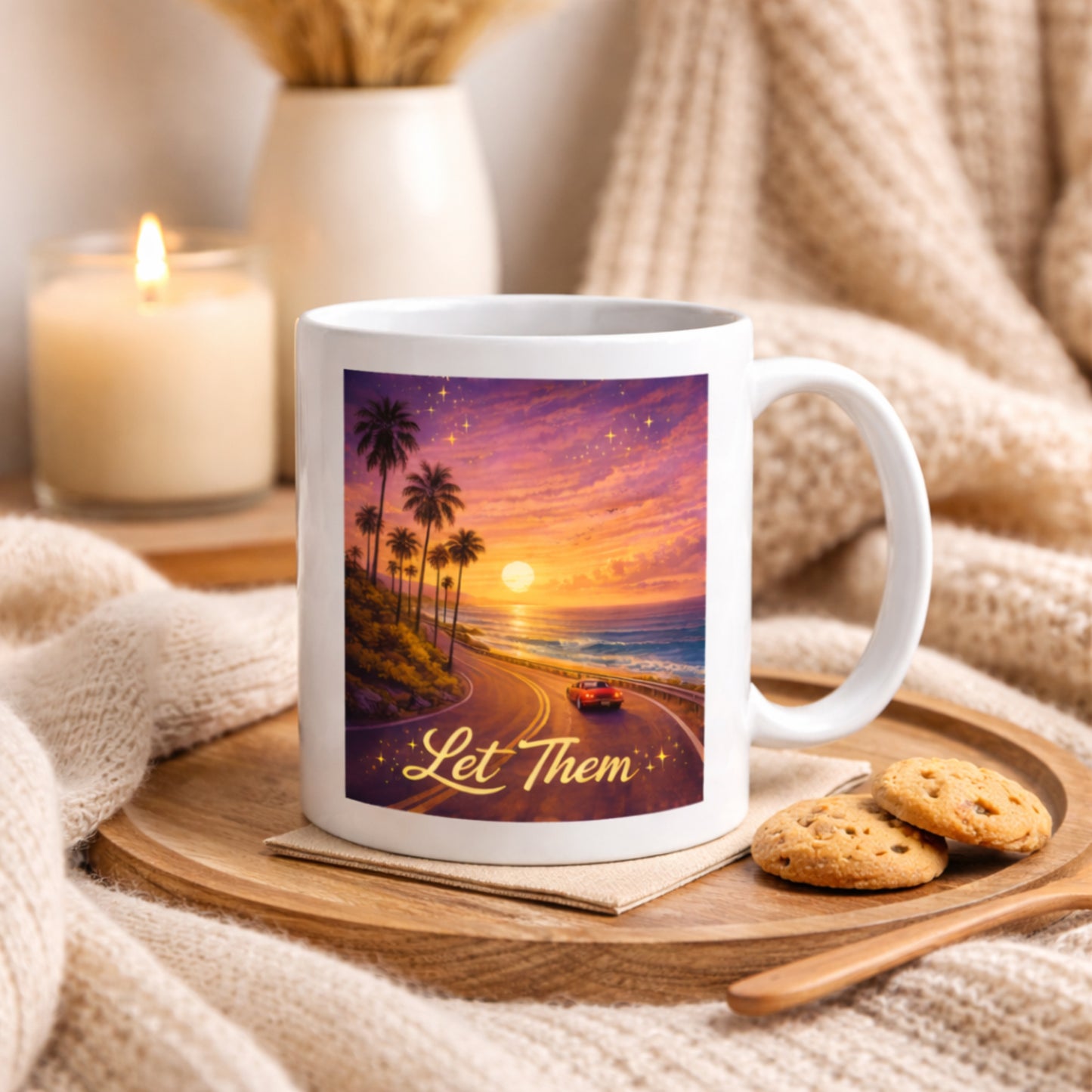 Let Them motivational mug in a cozy setting with blanket and candle