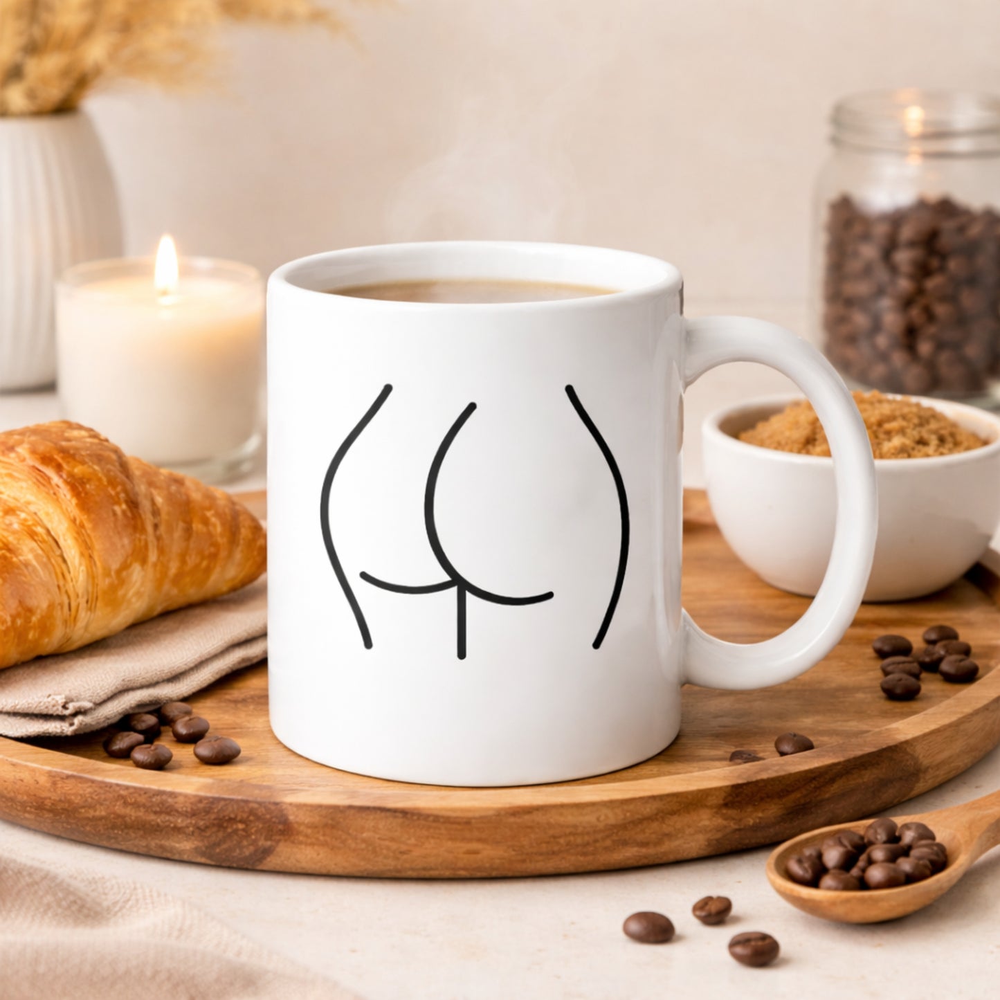 Minimalist line art mug filled with coffee in a warm lifestyle setting with pastries
