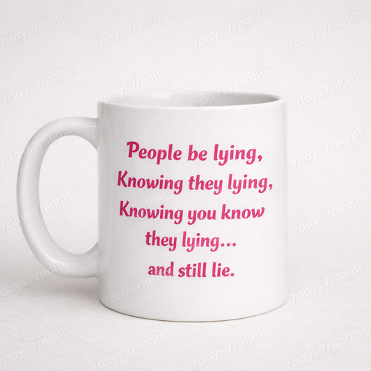 White ceramic mug with pink text reading People be lying quote.