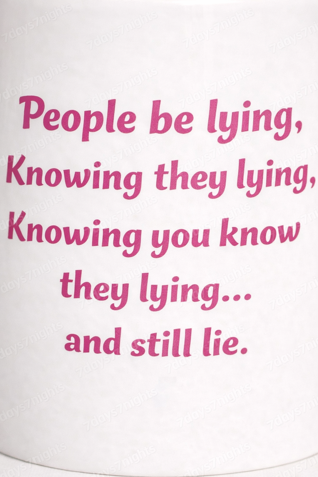Close-up of pink text People be lying coffee mug.